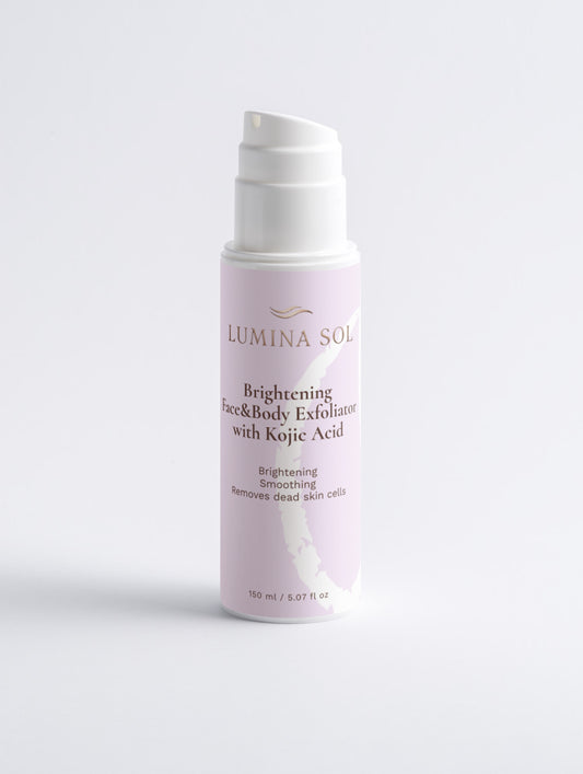 Brightening Face and Body Exfoliator with Kojic Acid — front view of white tube on light surface