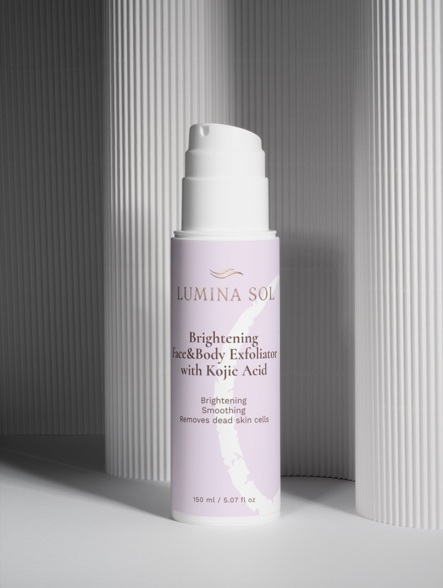 Brightening Face and Body Exfoliator — side angle showing product texture and packaging detail