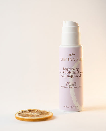 Brightening Exfoliator — lifestyle shot on marble surface with eucalyptus	
