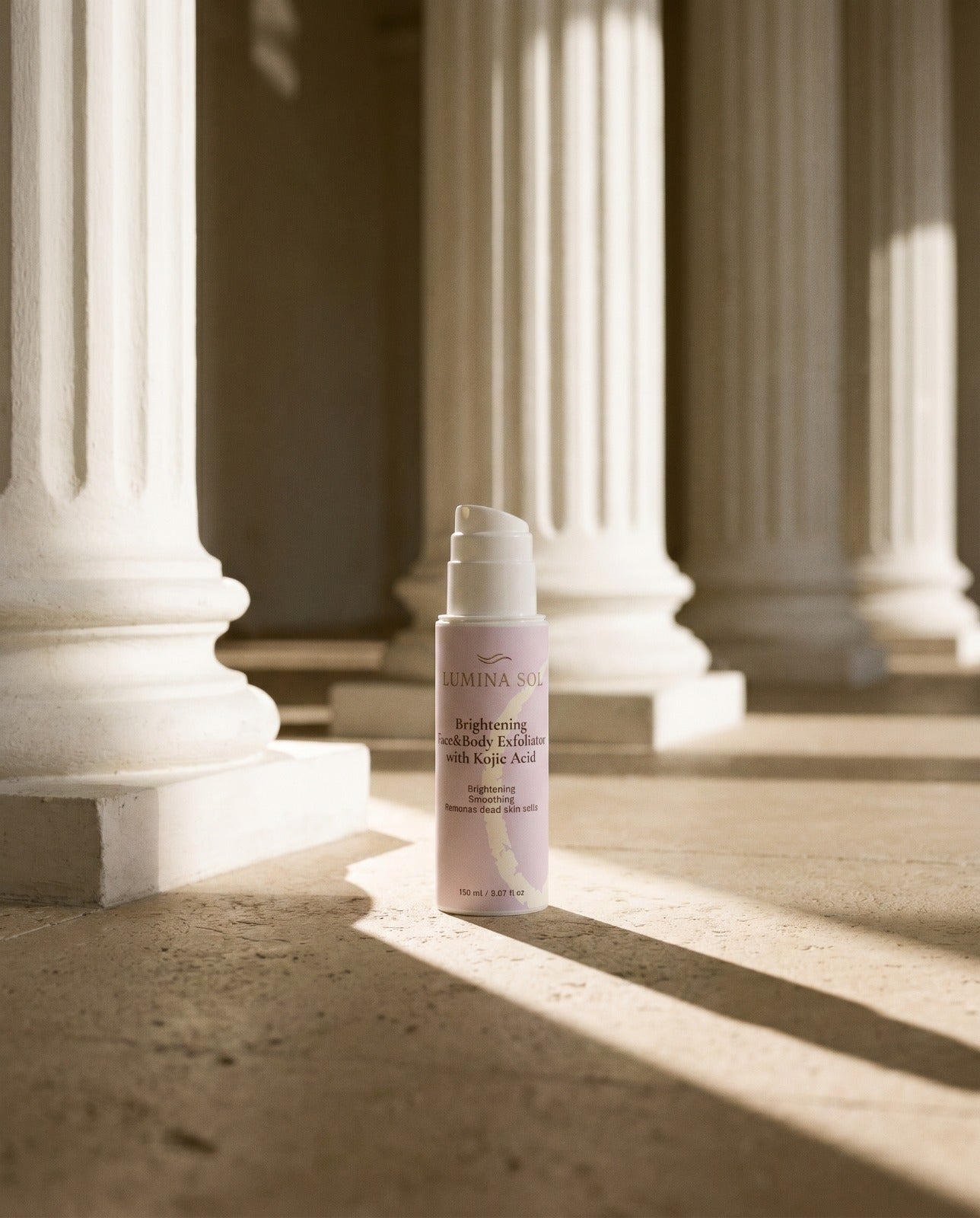 Brightening Face and Body Exfoliator — flat lay with natural botanicals	