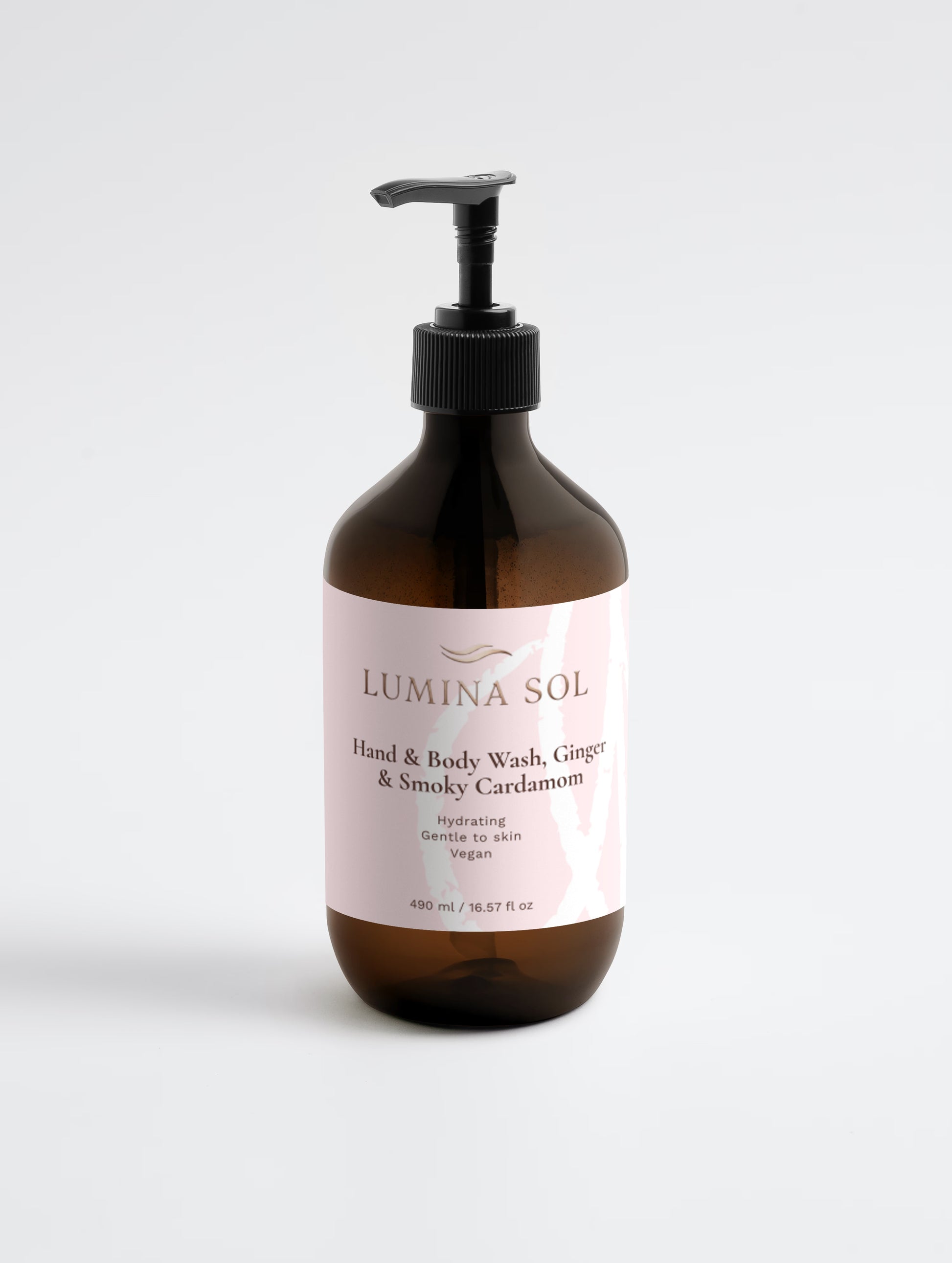 Hand and Body Wash Ginger and Smoky Cardamom — front view of amber bottle on neutral background